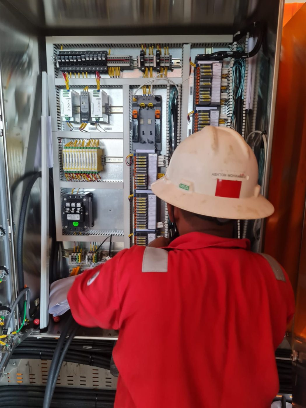 Ronco technician terminating a control and instrumentation panel